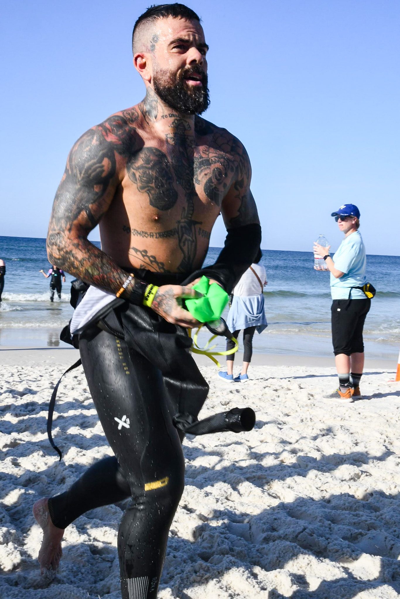 Scott Britton exiting the swim at an Ironman
